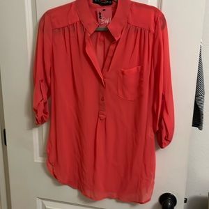 Coral colored blouse, easy style